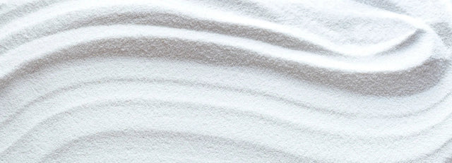 Badewannenrückwand Weißer Sand mit Wellenmuster
