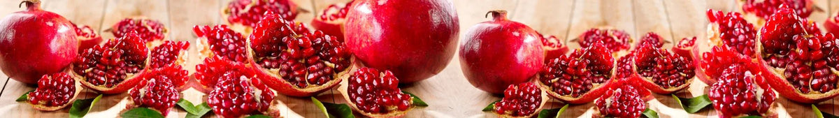 Glasbild Granatapfel - Schön und Wieder