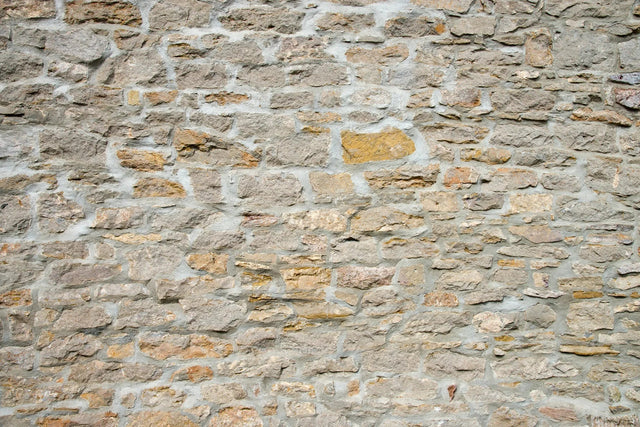 Waschbeckenrückwand Natursteinmauer hell
